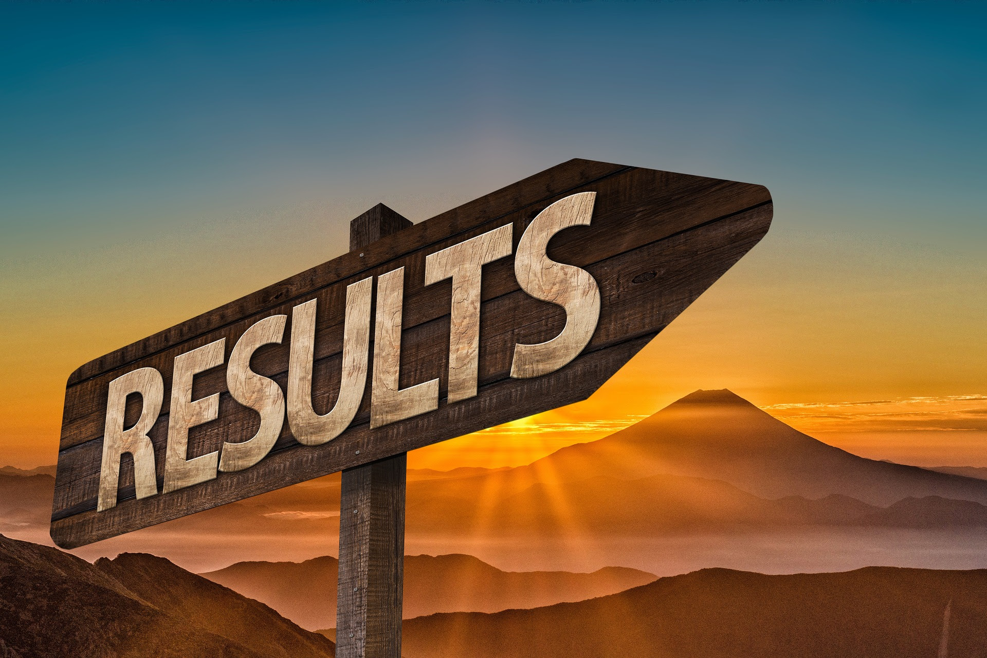 Graphic showing a brown signpost with the word "results" on it, against a mountain sunset background.