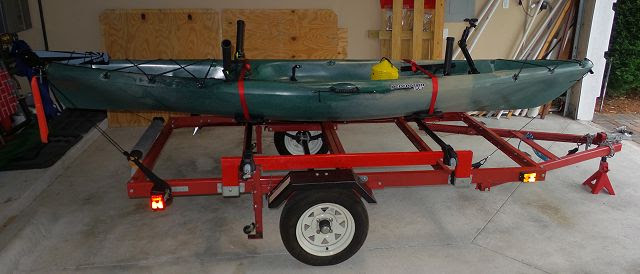 This is the inexpensive folding 4'x8' haulmaster 1200 lb flatbed trailer (deck not included) that goes for about $300 at harbor freight. Harbor Freight Folding Trailer For Hauling Kayaks Canoes Jaxkayakfishing Com