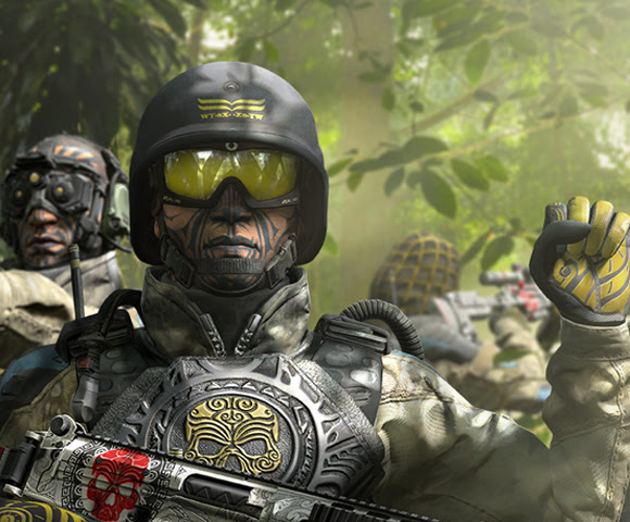 Soldiers wearing camouflage gear decorated with skulls and walking through the jungle.