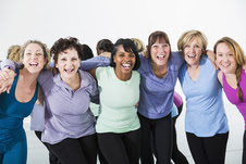 Group of women celebrating after exercising