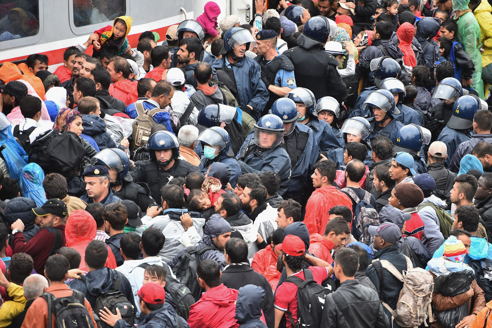 Croatia - Tovarnik Refugees pushing to get on train to Slovenia October 2015 Photo: AP