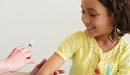 girl  getting vaccination