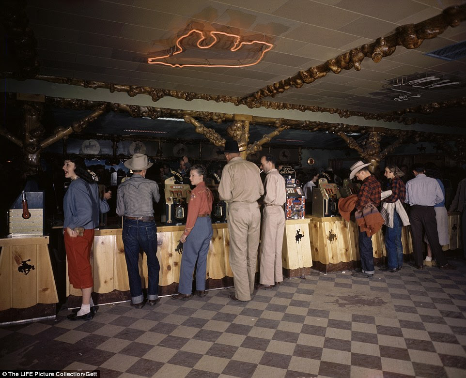 Patrons gambling and playing slot machines. Escaping the stresses of early 20th century city life, 'dudes' would journey from the hustle and bustle in search of a Western retreat