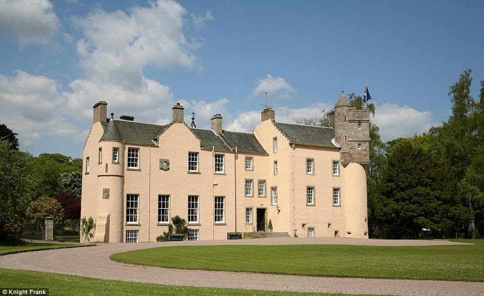 Striking: The cream stone Myres Castle near St Andrews comes with two additional properties and has 10 bedrooms, a library, a Victorian kitchen and a billiards room