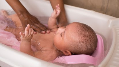 Your baby may be bathed on a towel, blanket, or changing table until his umbilical cord falls off or until he is old enough to sit up. The Steps To Your Baby S First Bath