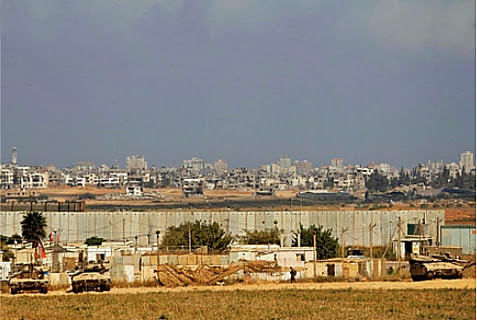 IDF tanks redeployed to southern Israel along the border with Gaza when Israeli forces prepared to clear the area on August 06, 2014.