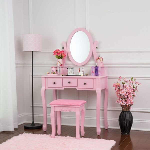 Behind her is an open jewelry box. 51 Makeup Vanity Tables To Organize Your Makeup Collection