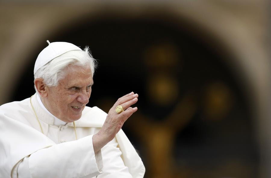 Pope Benedict XVI wearing white priestly robe.