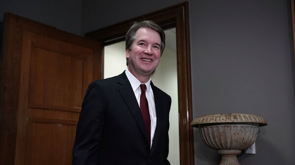 Supreme Court nominee Judge Brett Kavanaugh arrives at a meeting on Capitol Hill in July. Barring a surprise, he's likely to don the Supreme Court robe perhaps by the start of the court's new term on Oct. 1.