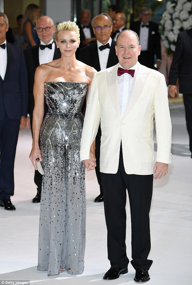 Silver stunner: Joining her at the bash was Charlene, Princess of Monaco and her husband Prince Albert II, with both the couple looking dashing in chic ensembles