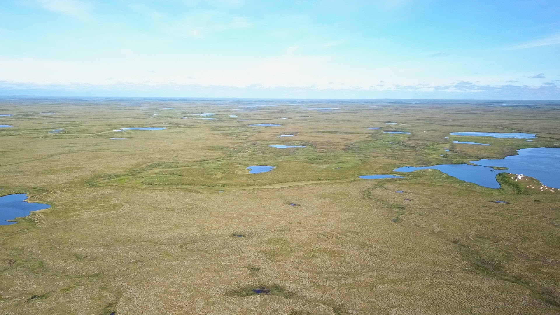 As the permafrost thaws, the landscape above it changes.