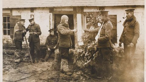 Troops receiving the King's and Queen's Christmas cards, 1914