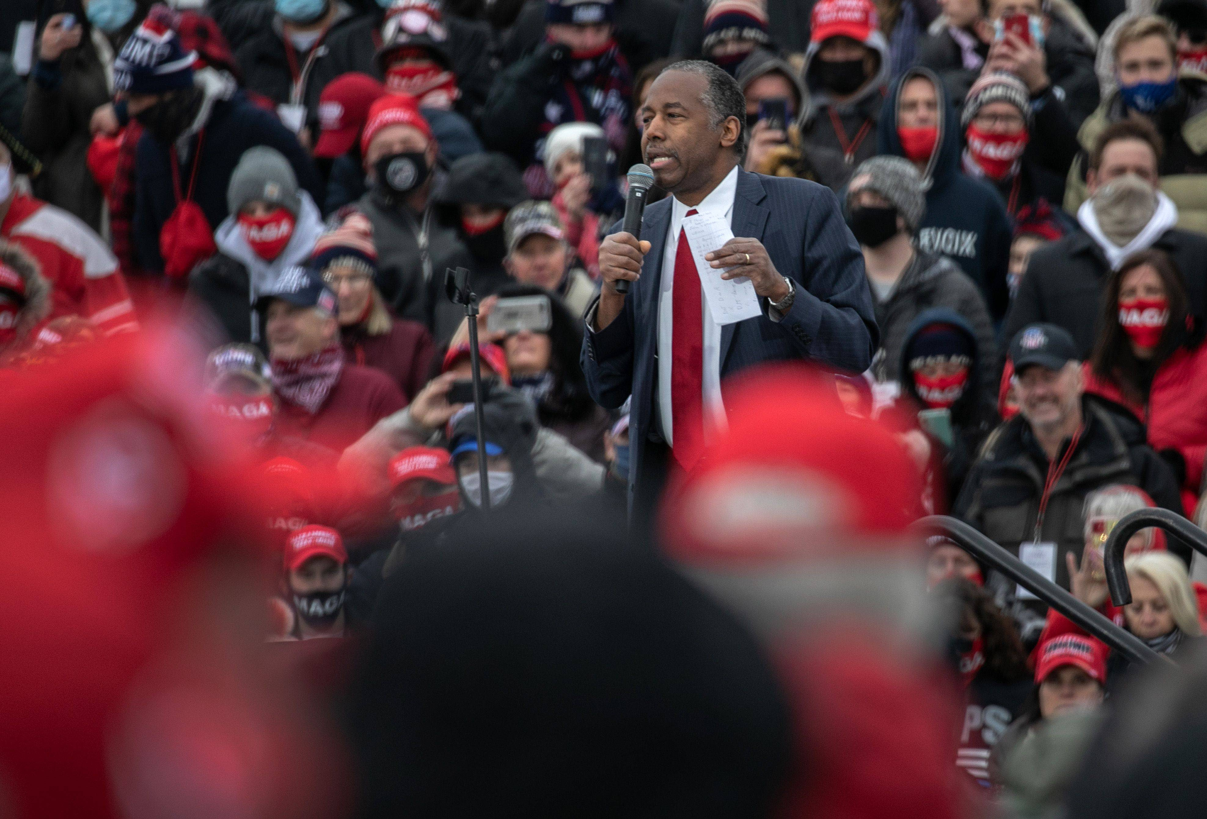 Ben Carson speaks at a rally for President Trump on Oct. 30 in Michigan. A week later, the HUD secretary announced he tested positive for the coronavirus. (John Moore/Getty Images)