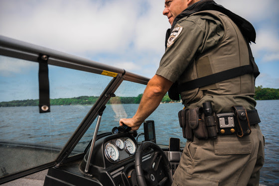 Maine game warden on the water