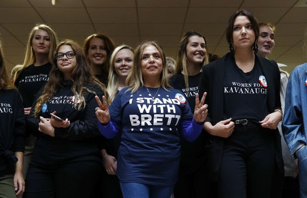 Supporters of Supreme Court nominee Brett Kavanaugh gather inside the Hart Senate Office Building on Capitol Hill in Washington, Thursday, Sept. 27, 2018. The Senate Judiciary Committee is hearing from Christine Blasey Ford, the woman who says Kavanaugh sexually assaulted her. (AP Photo/Patrick Semansky)