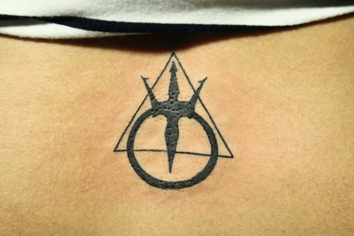 Little octopus tattoo design for men: Minimalist Tattoo Ideas Designs That Prove Subtle Things Can Be The Most Beautiful Black Poison Tattoo Studio