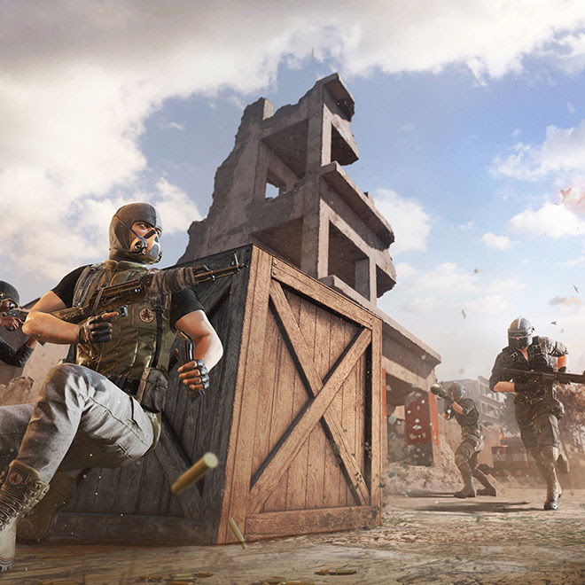 A player character takes cover behind a large crate on a battlefield.