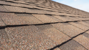 Close-up of asphalt shingles on a roof. 