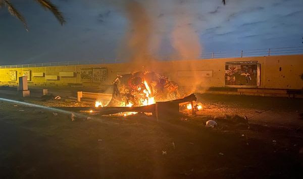 This photo released by the Iraqi Prime Minister Press Office shows a burning vehicle at the Baghdad International Airport following an airstrike in Baghdad, Iraq, early Friday, Jan. 3, 2020. The Pentagon said Thursday that the U.S. military has killed Gen. Qassem Soleimani, the head of Iran&#39;s elite Quds Force, at the direction of President Donald Trump. (Iraqi Prime Minister Press Office via AP)