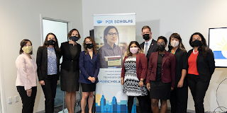 Secretary Walsh stands with Women's Bureau Director Wendy Chun-Hoon and other Women's Bureau staff