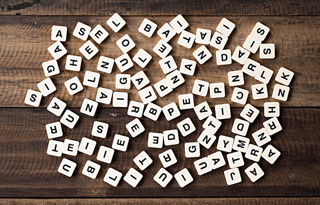 Scrambled letters on a table.