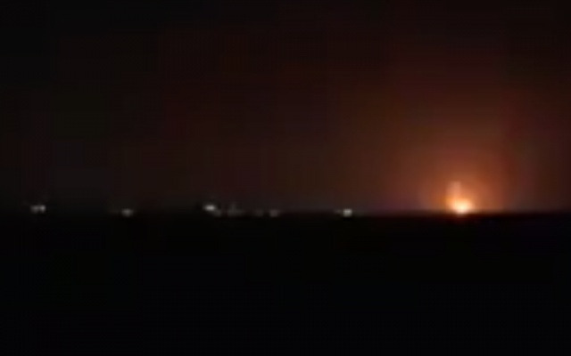 Illustrative: Explosions in the northern Gaza Strip from Israeli airstrikes light up the night sky on January 22, 2019. (Screen capture: Channel 13)