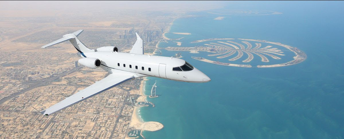 Photo of privatye jet flying over Dubai.