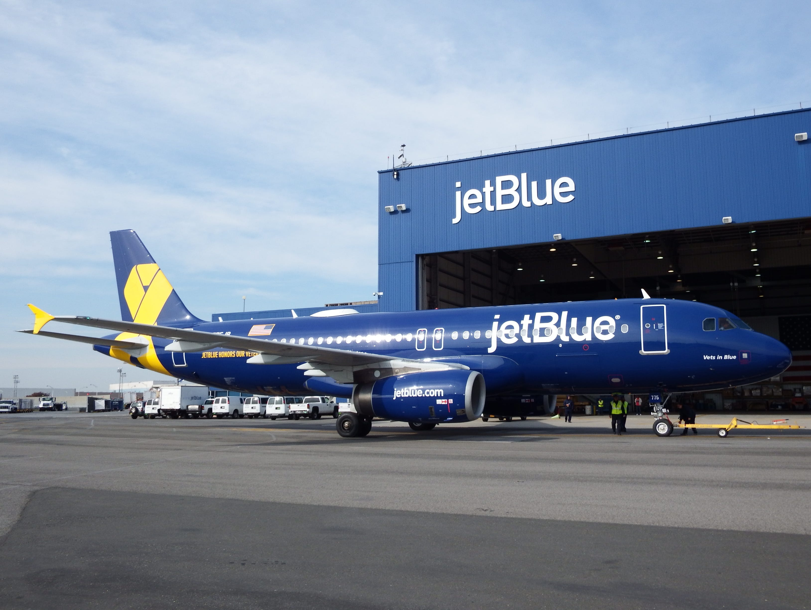 JetBlue's 'Vets in Blue’ Airbus A320 is seen at New York’s JFK Airport on Nov.  9, 2014, after arriving from a paint shop facility in Indiana.  JetBlue officially unveiled the paint scheme a day later on a special charter flight from New York JFK to 