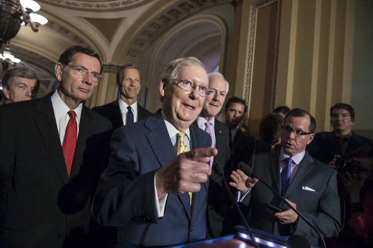 Mitch McConnell and Republican colleagues meet&nbsp;with reporters&nbsp;at the Capitol on&nbsp;Tuesday. (J. Scott Applewhite/AP)</p>
