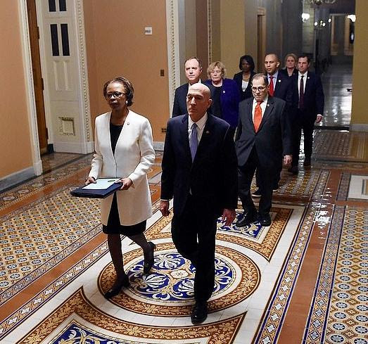 Clerk of the house Cheryl Johnson leads House Managers