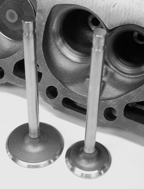 This video shows how to set up and modify a head on a mill to put rocker arm studs in a head that originally had push in studs. Iron Vortec Head