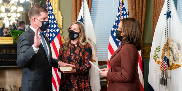 Vice President Kamala Harris swears in Marty Walsh as Secretary of Labor in March 2021. 