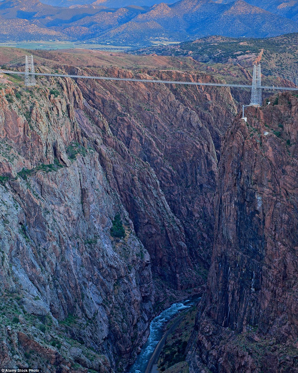 Don't look down: The Royal                                                           Gorge                                                           Suspension                                                           bridge in                                                           Colorado is                                                           America s                                                           highest                                                           suspension                                                           bridge at                                                           1,053 feet                                                           above ground