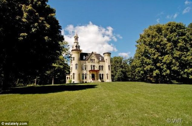 Real-life palace: This beautiful 1885 castle tucked away in Wayne, Illinois features five wood-burning fireplaces and a five-story spire while all together listed for $1,800,000