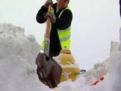 Person Shoveling Snow