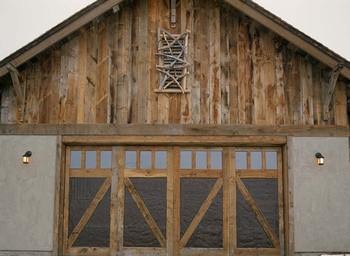 We offer the rustic style in a wide variety of our products such as front doors, patio doors, dutch doors, and even garage doors. Custom Wood Garage Doors By Montana Rustics