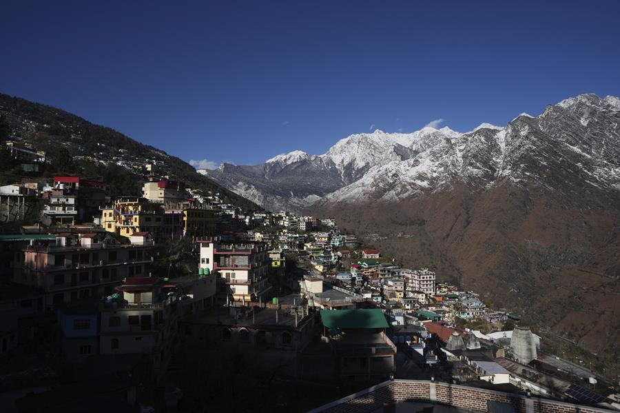 Joshimath town is seen along side snow capped mountains, in India's Himalayan mountain state of Uttarakhand.