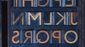 Printing type; A full alphabet of Johnston wood letter type, 1947