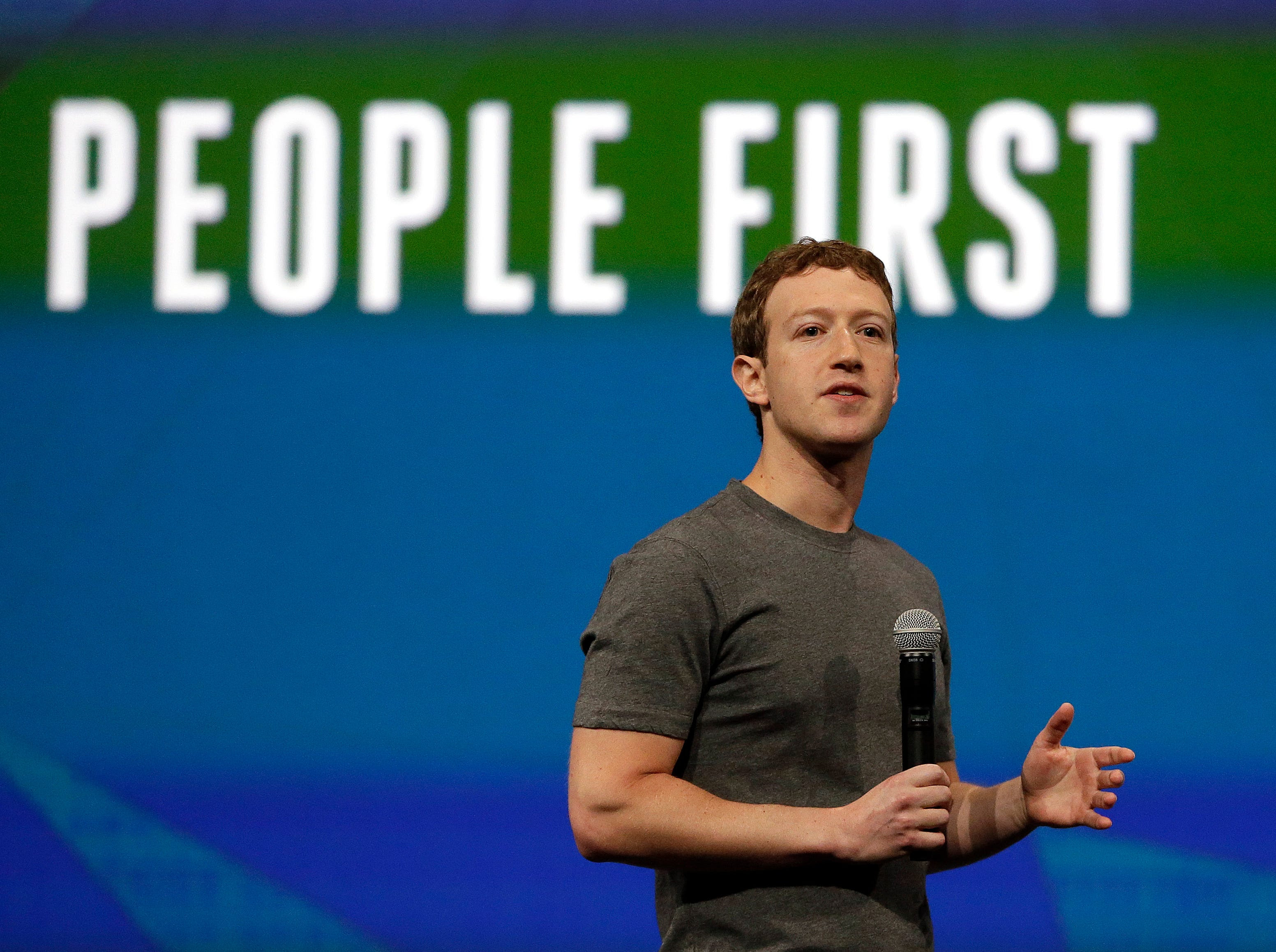 Facebook CEO Mark Zuckerberg gestures while delivering the keynote address at the f8 Facebook Developer Conference on April 30 in San Francisco.