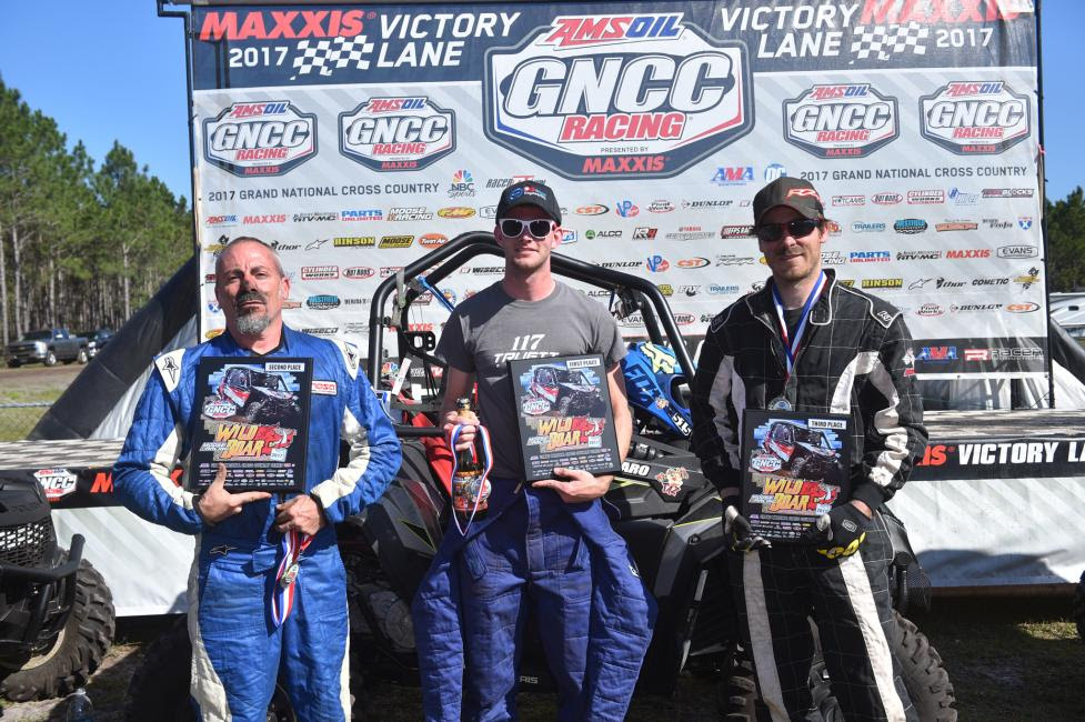 Single Seat UTV Overall Podium: (2) Chris Ferraro, (1) Collin Truett, (3) Robert Boynton.