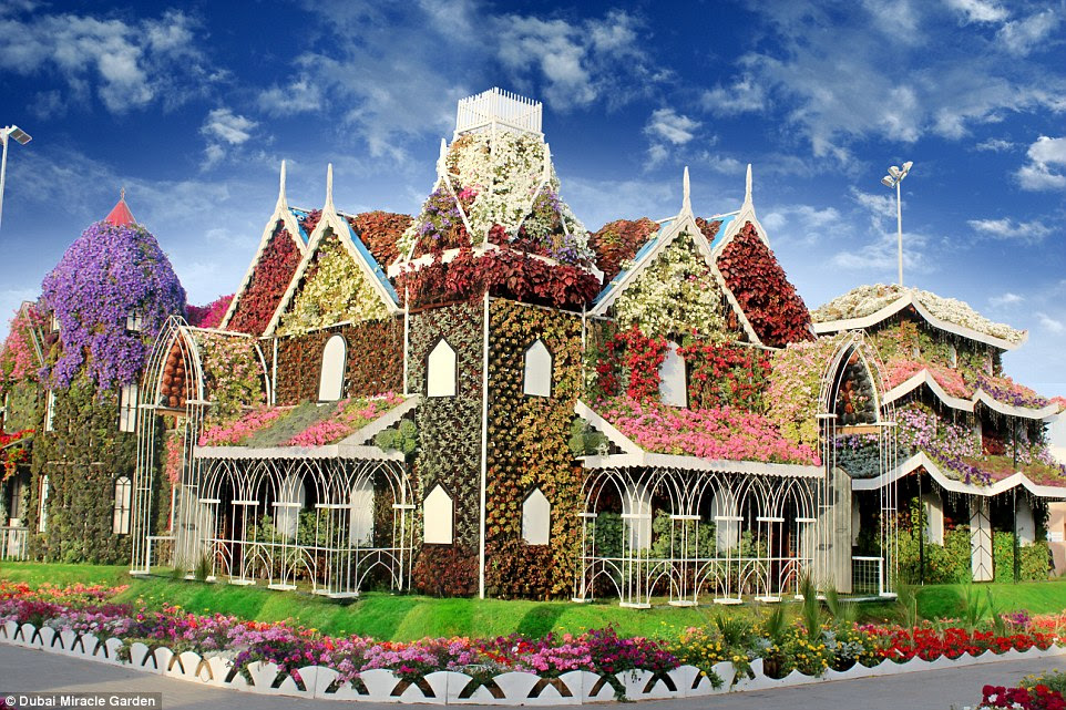 Giant structures can be viewed in the park, covered from top to bottom in an array of flowers