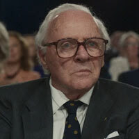 Screenshot of Anthony Hopkins sitting in an audience from the film "One Life".