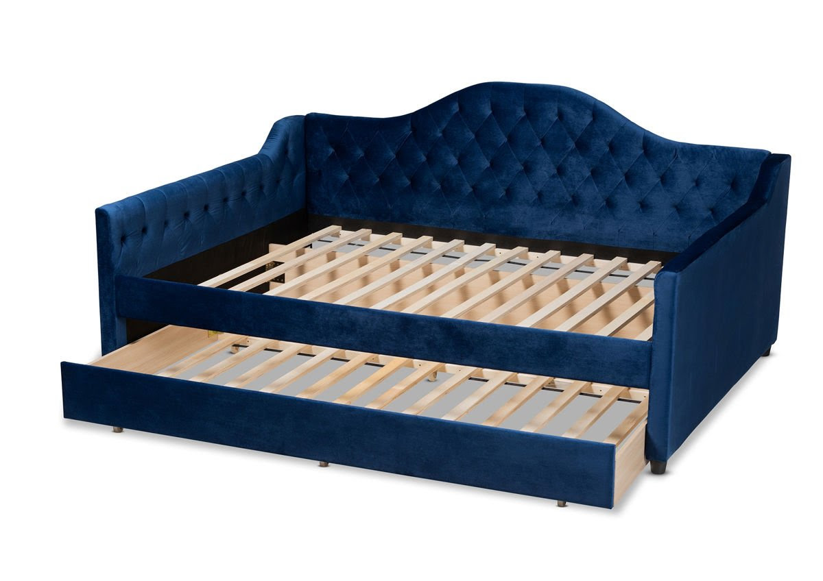 The classic bedroom design is upholstered in fabric which goes with any decor. Baxton Studio Perry Navy Blue Velvet Button Tufted Queen Daybed With Trundle