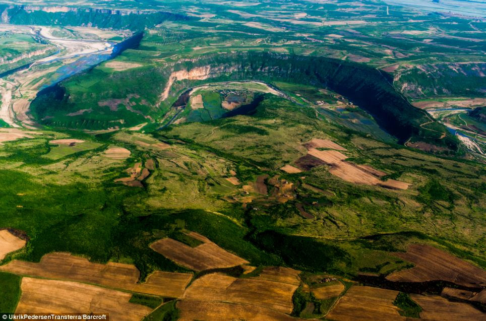 Seen from above: While Pedersen's photography was restricted while he was on the ground, in the air he was able to capture shots from the window of his plane