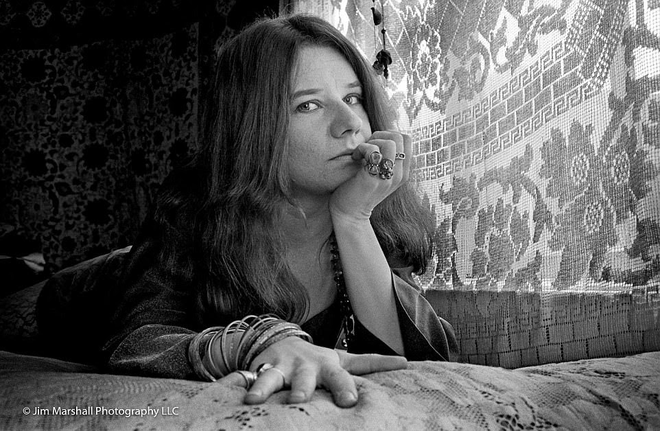 Janis Joplin, pictured on her bed in her apartment on Lyon Street in December 1967, is one of many legendary stars to allow intimate access to photographer Jim Marshall, who preferred candid photos to staged shots as he followed the musicians through their lives