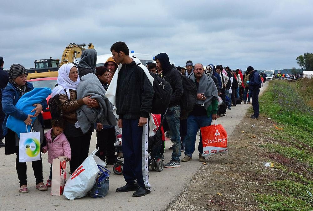 Refugees entering Strosinci, Croatia, Satrurday 26 September 2015