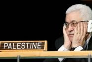 Abbas sits behind 