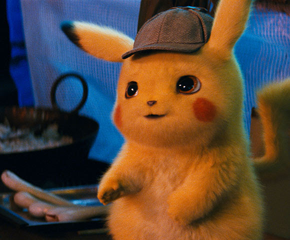 A smiling Detective Pikachu wearing a cap.