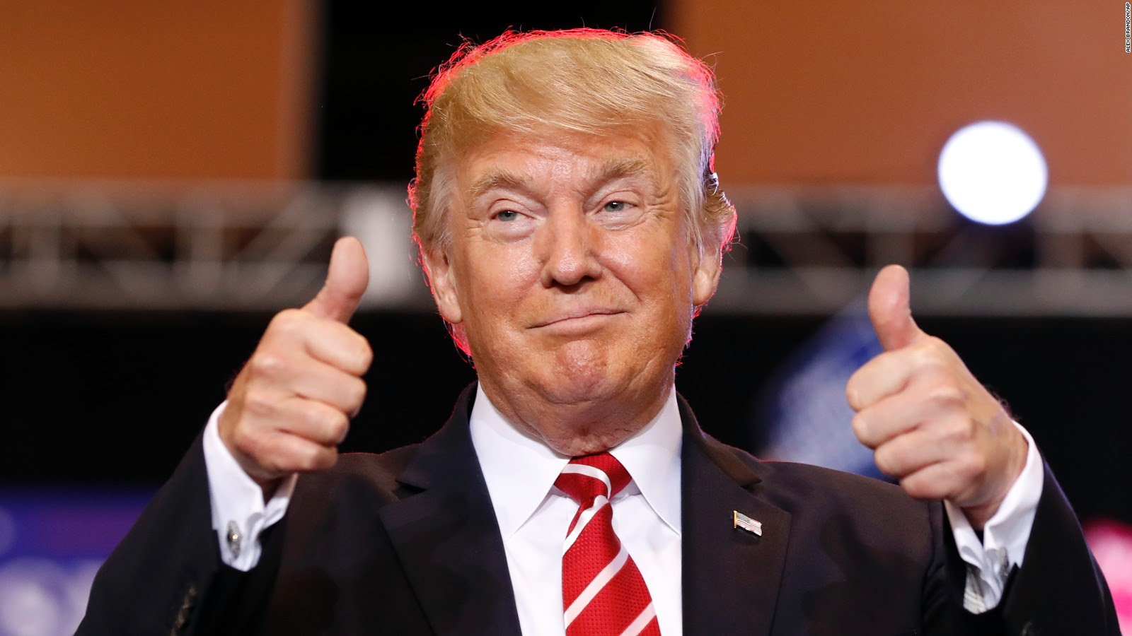 Picture of Donald Trump with two thumbs up.