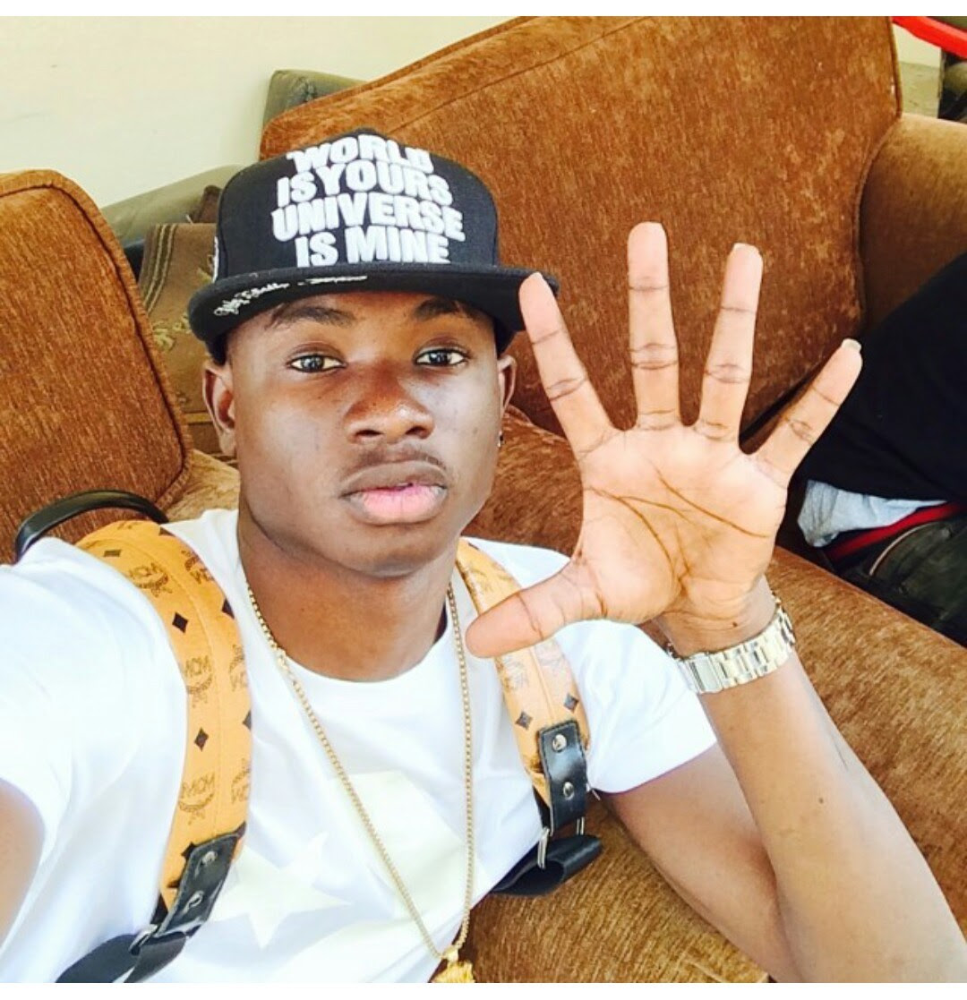 Are you border of listening to the old songs? Boggrad Like Olamide Lil Kesh Gets Colorful Hairstyle Photo